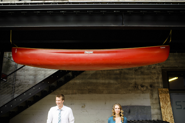 portrait of the happy couple under canoe - wedding photo by top Portland, Oregon wedding photographer Aaron Courter